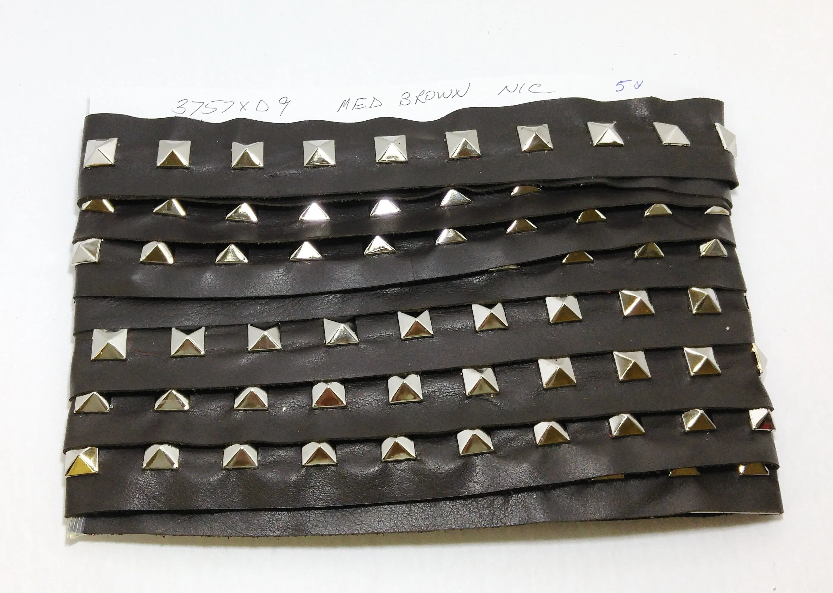 1 YD of 1-1/2" wide Genuine Cowhide Leather Trim Tape with Silver Square Pyramid Nailheads edge binding; top stitch; Med. Brown 3757XD9