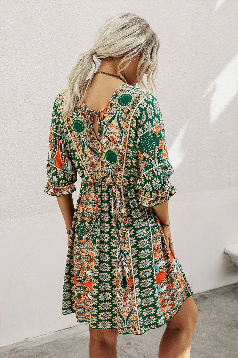 Green Boho Print Wrap Neck Tie Back Pleated Hem Dress