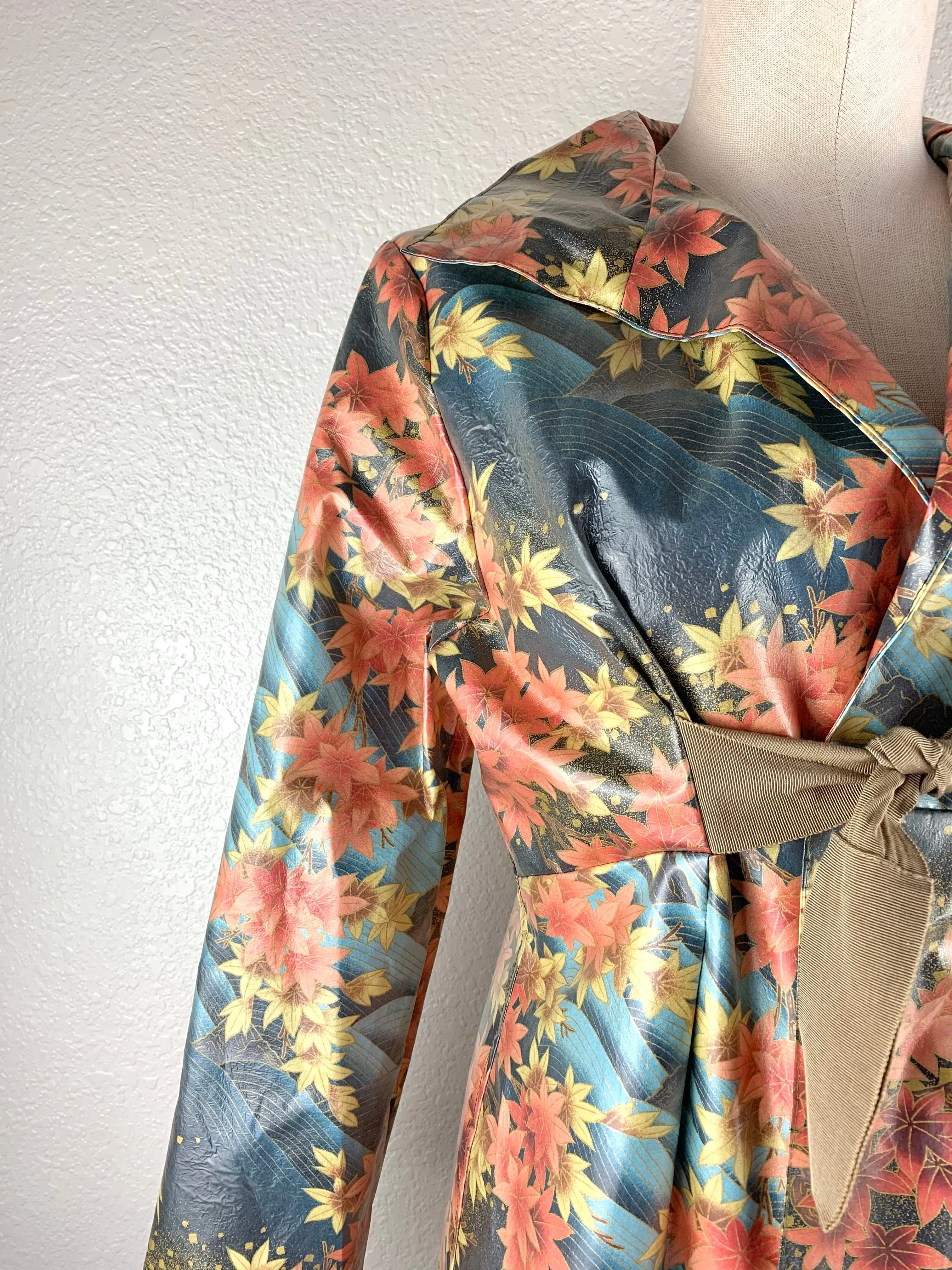 Leaf Printed Raincoat size XS