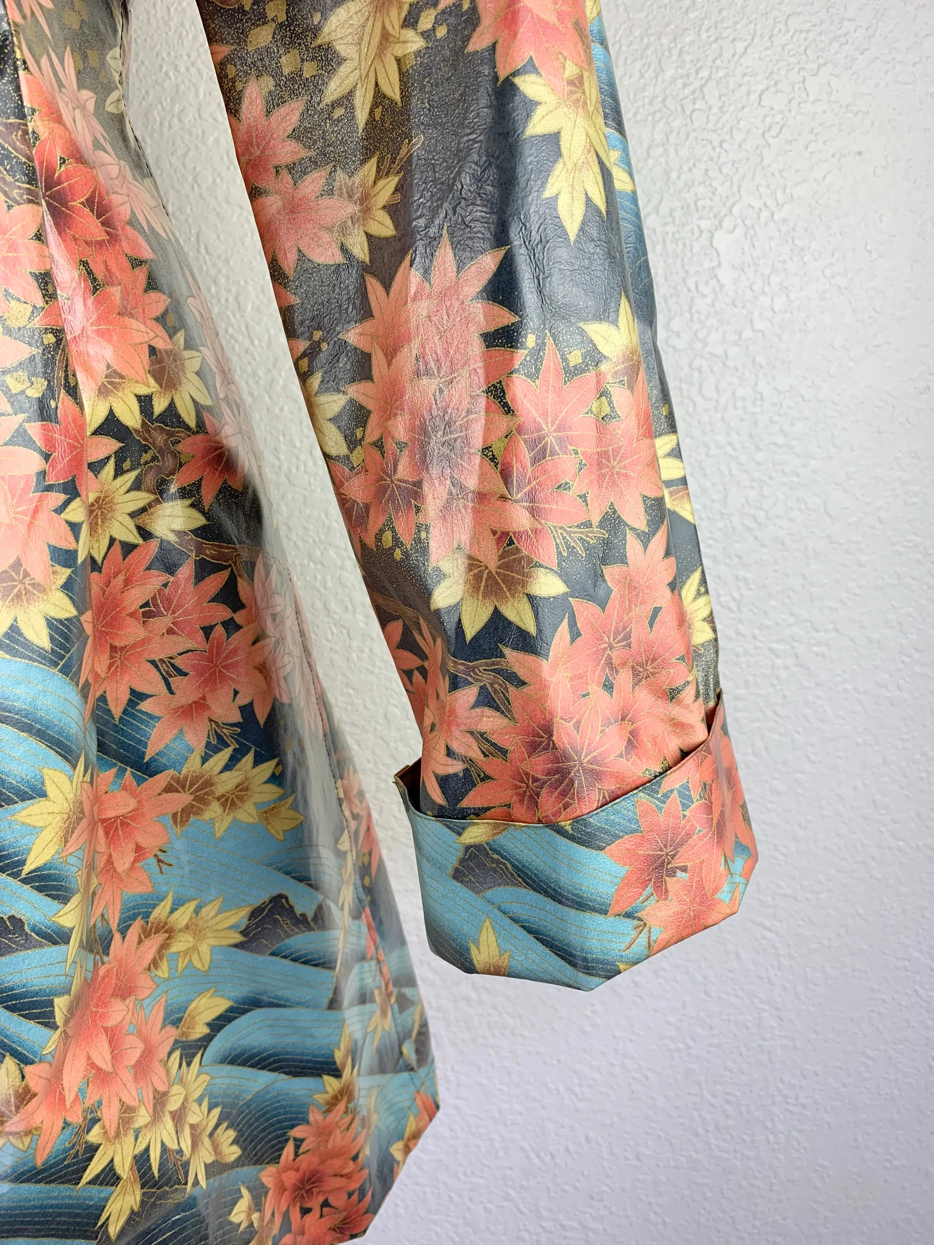 Leaf Printed Raincoat size XS
